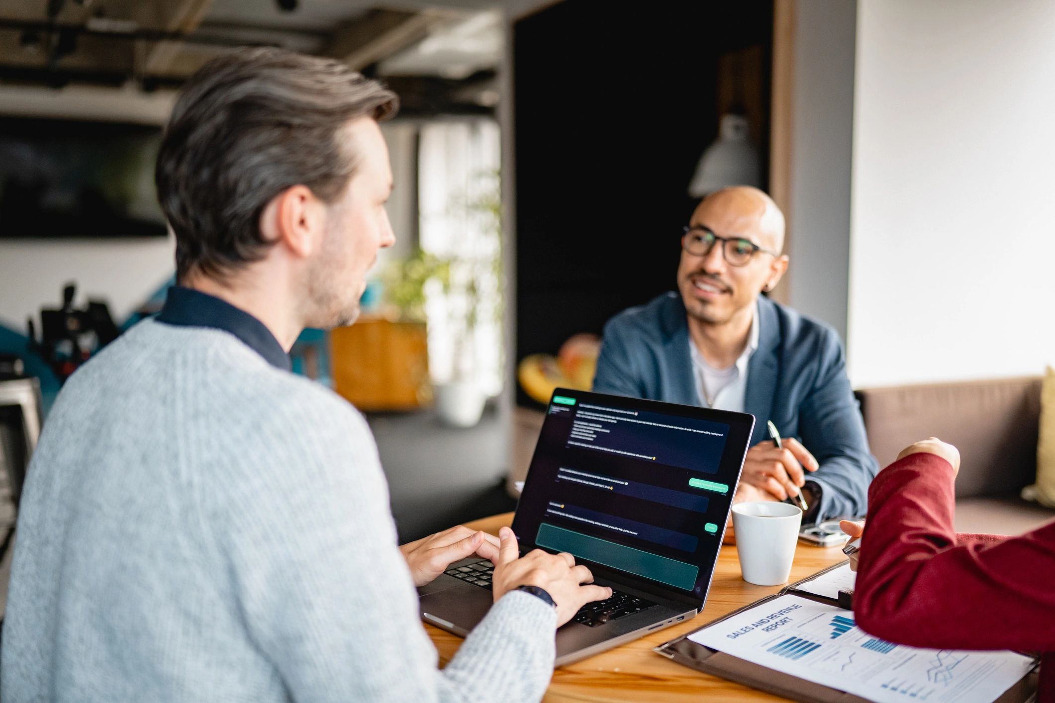 Technology team discussing AI strategy in a modern office